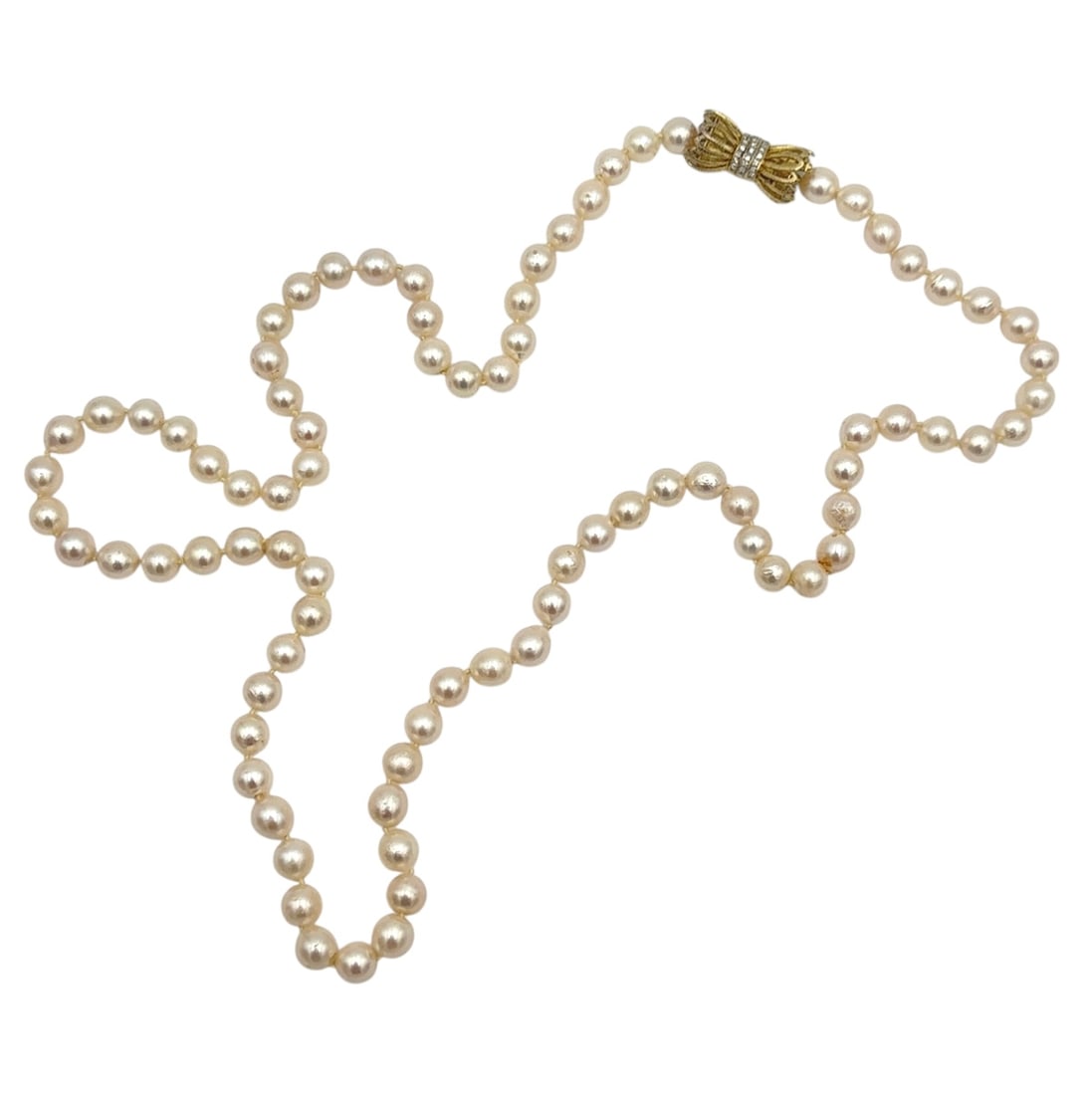 Pearl Strand with 14k Yellow Gold Diamond Clasp: Metal type: 14k yellow gold, Gemstones: Pearl - 8.4 mm diameter and diamond, Stamped with "b" and Chinese marker's mark, Measurement: 30" Length, Weight: 71.8 grams