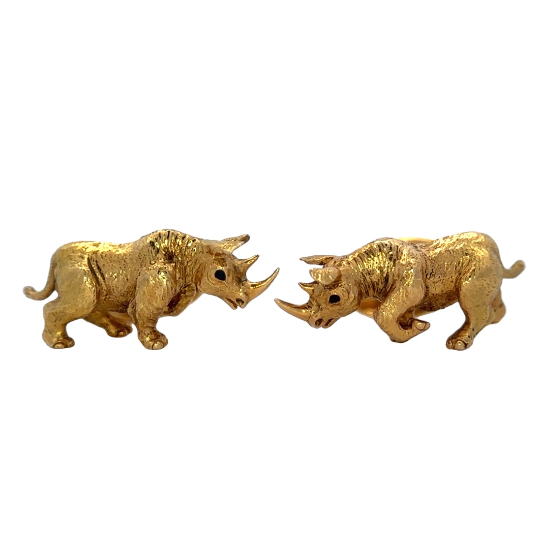 Tiffany & Co. Sapphire Rhino Cufflinks in 18K Yellow Gold: Brand: Tiffany & Co., Metal type: 18k yellow gold, Gemstone: Sapphire, Design: Rhino cufflinks, Measurement: 1" Length, Weight: 22.6 grams