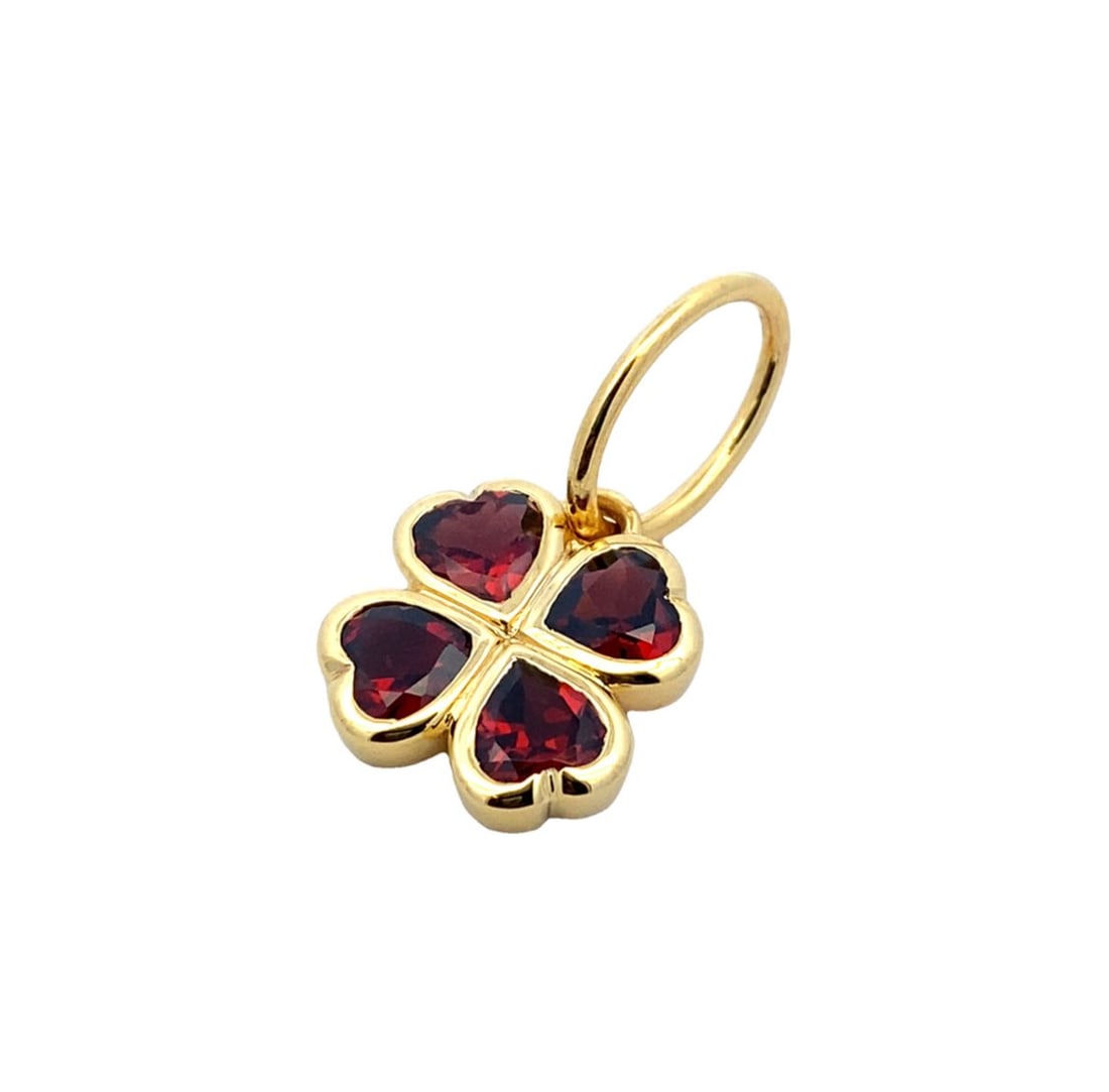 Four Leaf Clover Garnet Pendant in 14K Gold: Metal type: 14k yellow gold, Gemstone: Garnet, Design: Four leaf clover pendant, Measurement: 1.2 cm L x 2.4 cm H, Weight: 2.8 grams