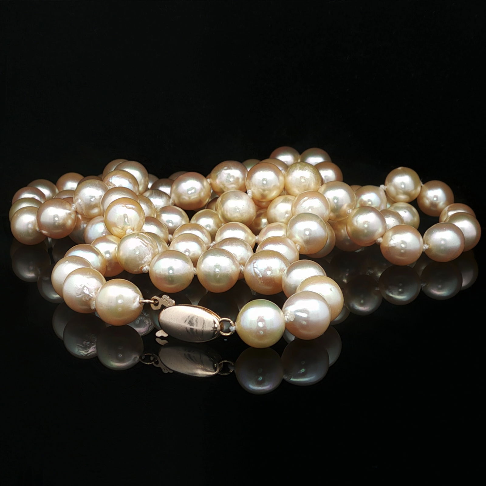 Pearl Beaded Necklace in 14K Yellow Gold: Metal type: 14k yellow gold, Gemstone: Pearl - approximately 8 mm diameter, Design: Beaded necklace, Measurement: 31" Length, Weight: 59.3 grams