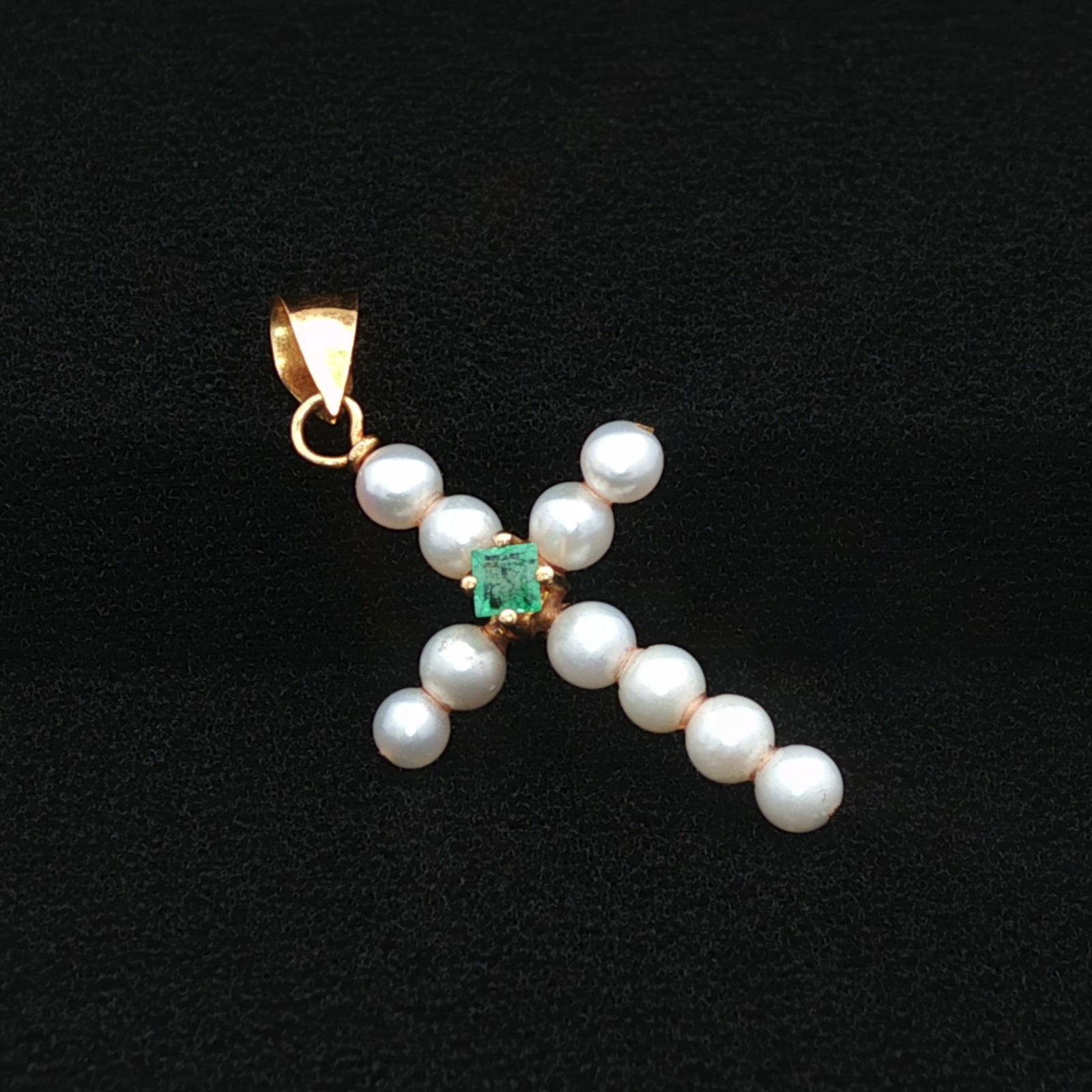 Emerald and Pearl Cross Pendant in 14K Yellow Gold: Metal type: 14k yellow gold, Gemstones: Pearl - 4 mm diameter and emerald, Design: Cross pendant, Measurement: 15 mm W x 30 mm H including bail, Weight: 0.8 grams