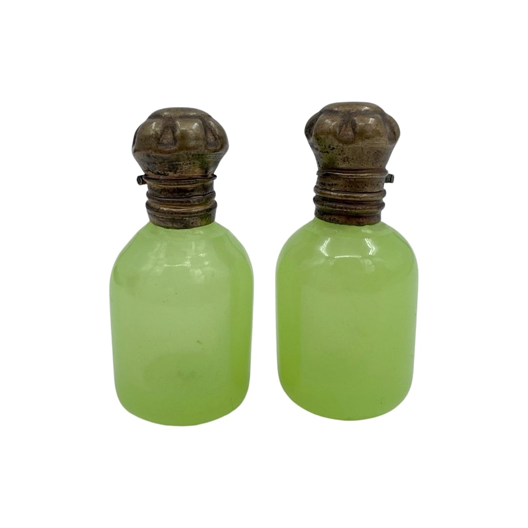 A pair of 1900's Uranium Opaline Scent Bottles: A pair of 1900s uranium opaline glass scent bottles, with brass lids, stoppers are missing, 4.8 cm each. Combined shipping is available for this item.
