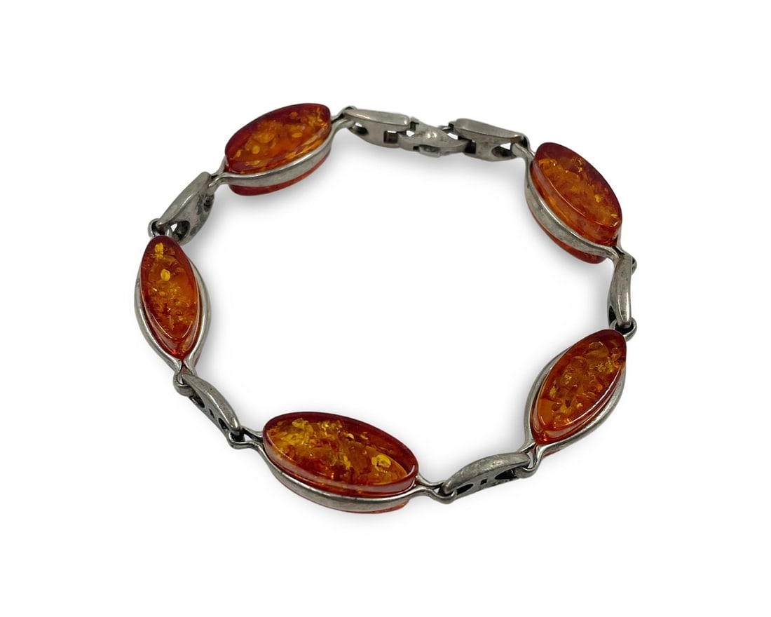 Old Natural Amber and 925 Hallmarked Sterling Silver Bracelet: Old natural Baltic amber and 925 hallmarked sterling silver bracelet, 21.6 grams, 19.5 cm long, beads are 2 cm long. There are no visible scratches on the beads. Combined shipping is available for thi