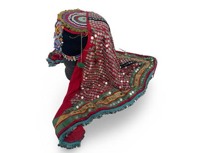 Ottoman Turkish Ladies' Headdress Decorated with Glass Beads and Fabric Ornaments: Description: Ottoman Turkish textile ladies' headdress decorated with glass beads and fabric ornaments. The red scarf on the top is so richly decorated that it feels heavy and for that reason secures