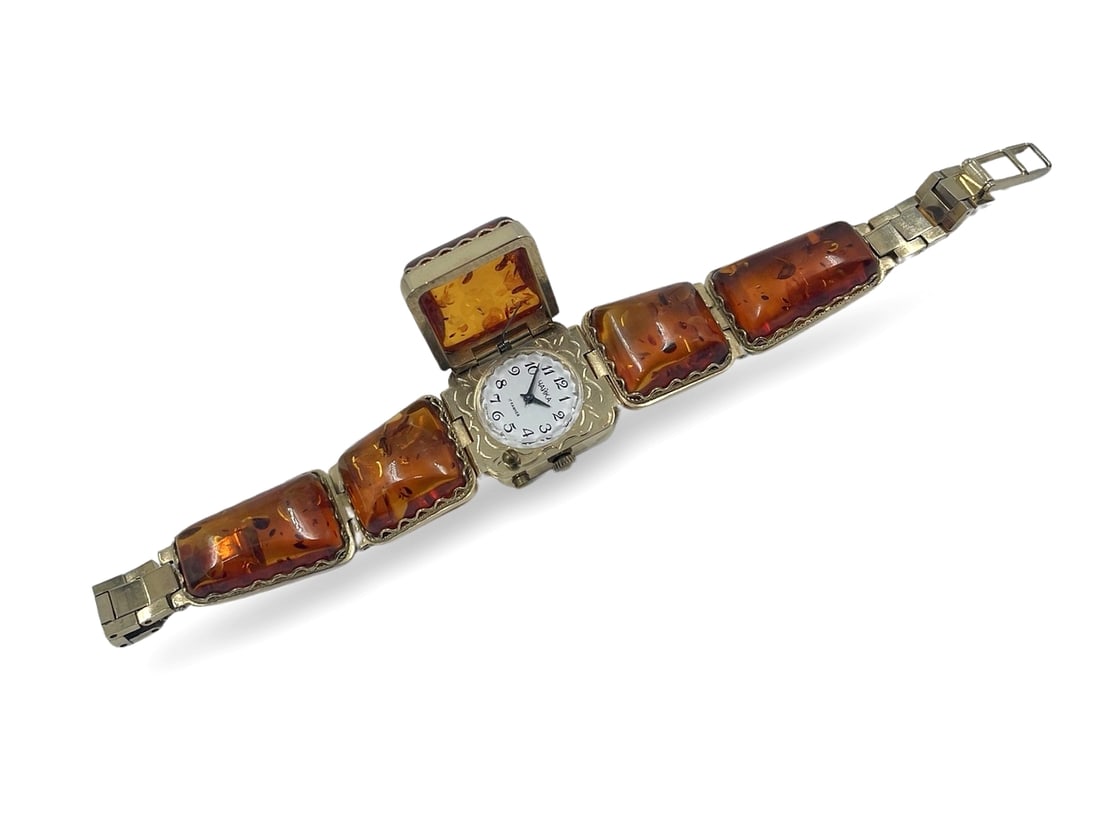 Vintage Soviet Russian Natural Baltic Amber "Chaika" Lady's Watch: Description: Vintage Soviet Russian natural Baltic amber "Chaika" 17 jewels lady's hidden wristwatch, mechanical winding, when the lid is closed, the item serves as a bracelet. 17.5 cm. Condition: in 