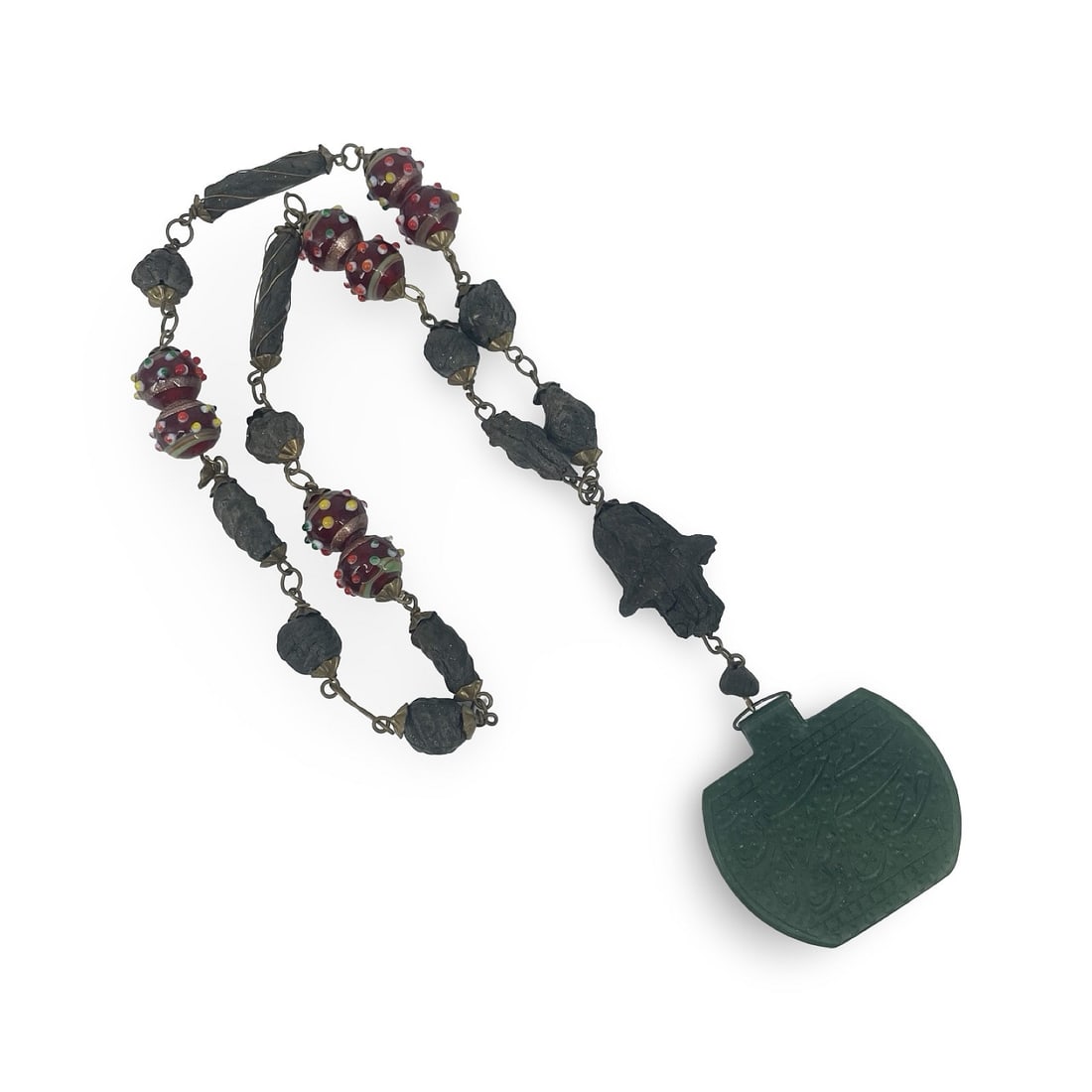 Indian Islamic Mughal Style Necklace: Indian Islamic Mughal style necklace with jade pendant decorated with protective prayers hand-carved in beautiful calligraphy, and glass beads. The pendant measures 5,5 x 6,5 cm and the drop length of
