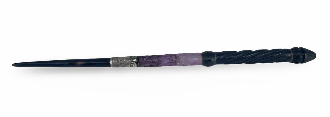 20th Century Middle Eastern Quran Pointer: Description: 20th century Middle Eastern Quran pointer with an amethyst stone in the middle section; other parts are made of ebony, and also there is an Islamic writing carved on the top of the pointe
