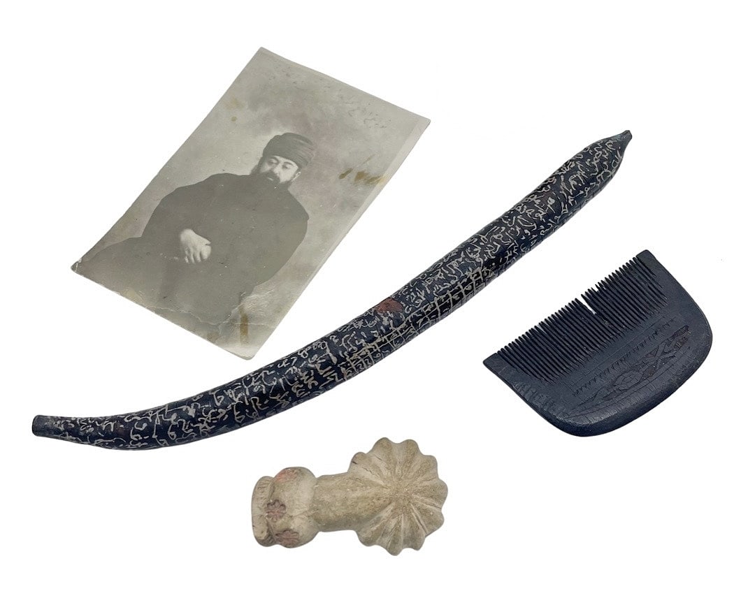Lot of Islamic Dervish Accessories: Description: Lot of Islamic Middle Eastern dervish accessories, including a dervish beard comb, opium pipe bowl (maybe clay), a papier mache talismanic stick decorated with calligraphic protective spe