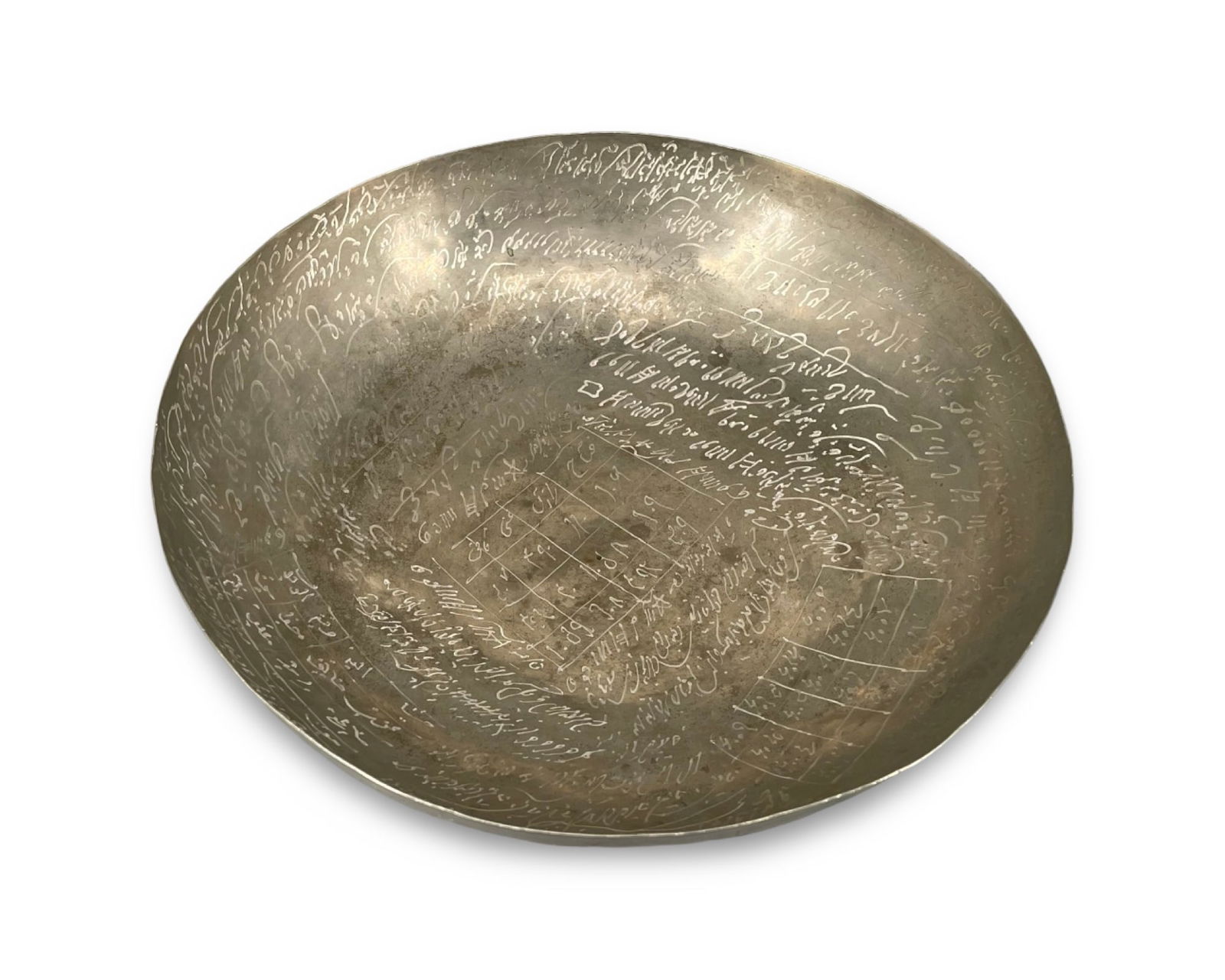 Islamic Iranian Persian Middle Eastern Copper Talismanic Healing Bowl: Islamic Iranian Persian Middle Eastern copper talismanic magic healing bowl richly decorated with handcarved elegant ornaments and healing prayers written in beautiful calligraphy. 22 cm in diameter.
