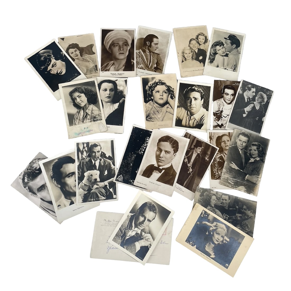 Lot of (23) 1930s-1950s Movie Artists PPCs: Lot of (23) 1930s-50s Hollywood movie starts and artists, including Charlie Chaplin, Elizabeth Taylor, Ingrid Bergman, James Dean, Gary Cooper, Eva Gardner, Greta Garbo, Marlene Deitrich, Gene Kelly,