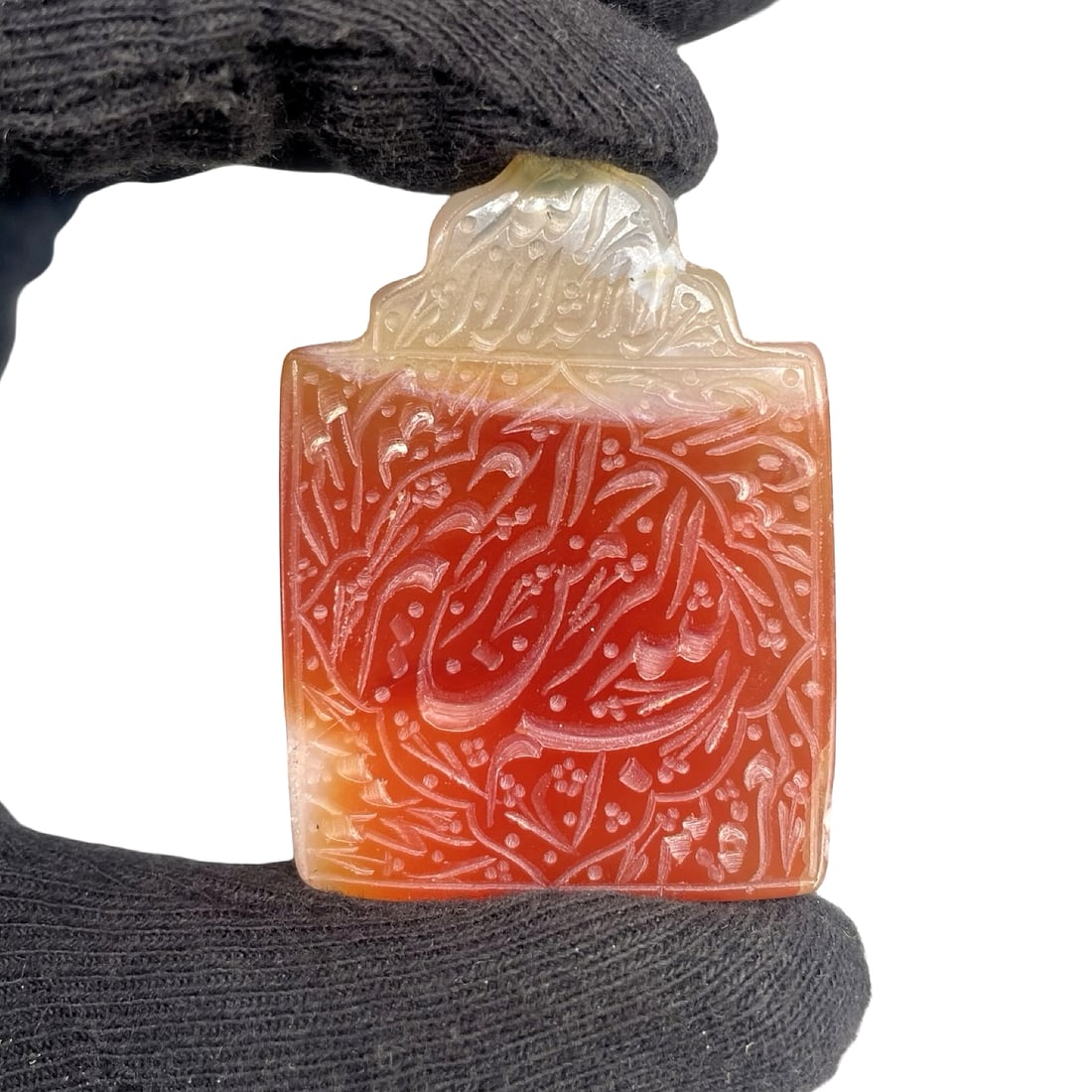 Islamic Middle Eastern Carnelian (Aqeeq) Talismanic Pendant with Arabic Inscription: Rectangular Islamic Middle Eastern talismanic pendant / plaque carved from translucent carnelian (aqeeq), displaying an attractive natural color transition from pale honey and milky white tones at the