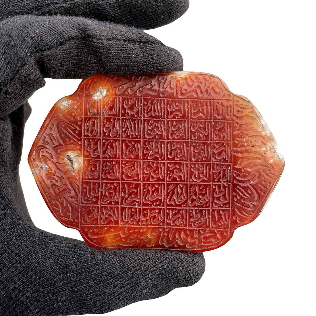 Islamic Middle Eastern Agate Talismanic Plaque with Magic Square (Vefk), 19th Century: Islamic Middle Eastern Persian handcarved agate talismanic plaque with Magic Square (Vefk), 19th century. 8 x 6 cm. Carved from translucent red-orange agate, this 19th century talismanic seal stone