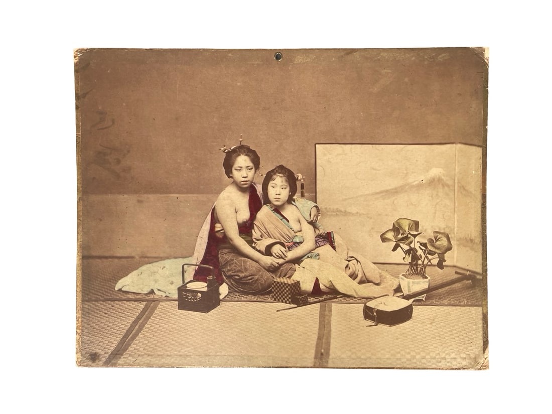 Yokohama School Hand-Colored Albumen Photograph, Japan, c. 1870 – Circle of Felice Beato: Japan, late 19th century (circa 1865–1885) hand-colored albumen print on original cardboard mount. Dimensions: approximately 21 × 27 cm (mounted). Large-format studio photograph depicting two