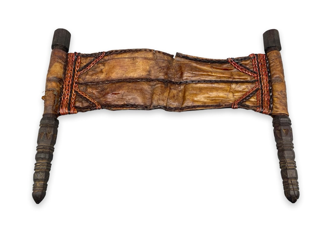 19th Century North African Saharan Portable Rahle (Rehal): 19th century North African Saharan portable Rahle (Rehal)Made of rawhide and carved wooden handles. We ship to the United States PROBLEM-FREE. All the packages will be shipped as DDP (Delivered Duty P