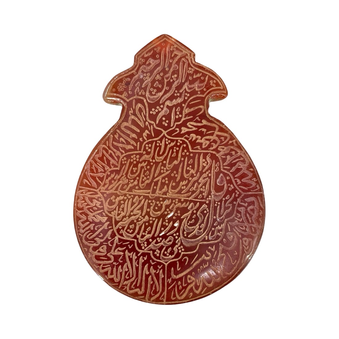 A Large and Exceptionally Carved Islamic Carnelian Agate (Yemeni Aqeeq) Talismanic Plaque, Deeply: A large carved Islamic carnelian agate (Yemeni Aqeeq) talismanic plaque, engraved with the "Nade Ali" supplication. This impressive, mihrab-shaped protective amulet is meticulously hand-carved from a 