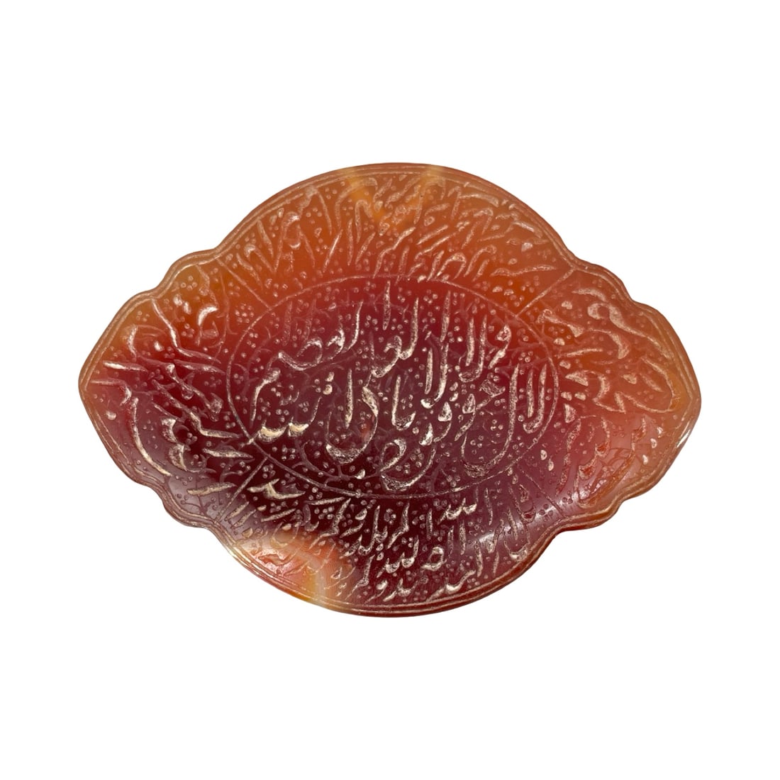 An Exquisite Hand-Carved Cartouche-Form Islamic Red Carnelian Agate (Yemeni Aqeeq) Talismanic Plaque: An Exquisite Hand-Carved Cartouche-Form Islamic Red Carnelian Agate (Yemeni Aqeeq) Talismanic Plaque with Elegant Calligraphic Borders. This magnificent horizontally oriented protective amulet is mast