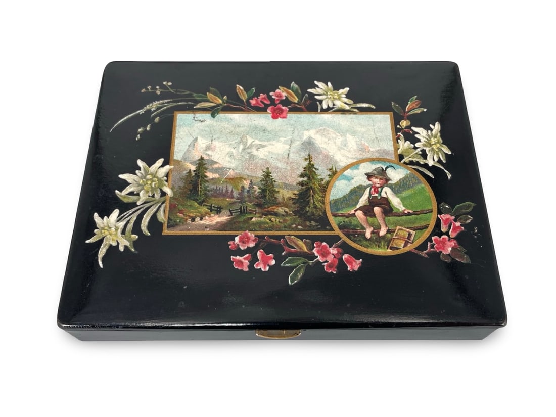 An Antique Swiss Black Lacquer Hand-Painted Alpine Souvenir Box, Late 19th Century: An Antique Swiss Black Lacquer Hand-Painted Alpine Souvenir Box, Late 19th Century. This exquisite late Victorian-era rectangular keepsake container stands as a premier example of historic Swiss Alpin