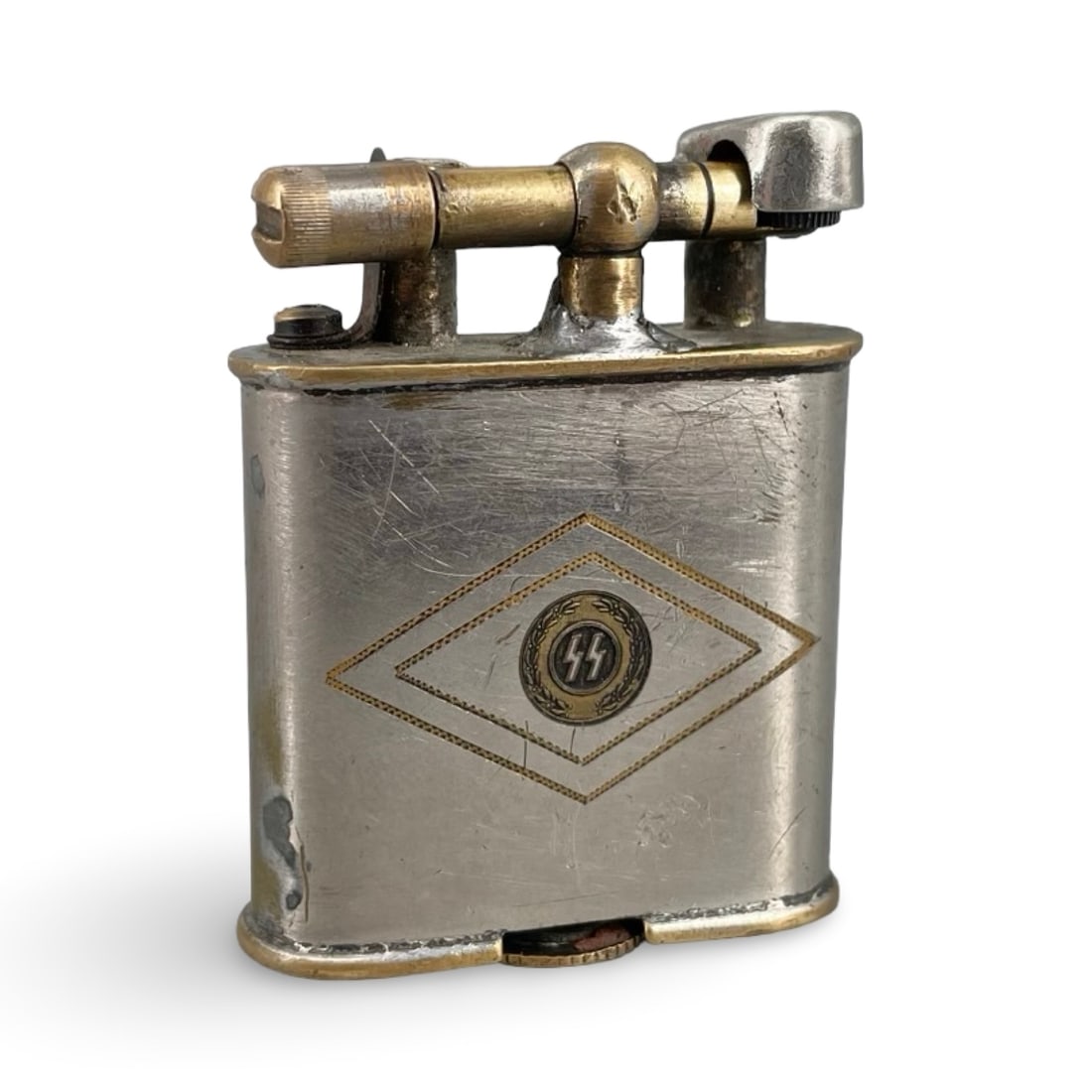 WWII German Third Reich Lift-Arm Trench Lighter Brass Accent SS Runes Medallion: WWII German Third Reich Lift-Arm Trench Lighter Brass Accent SS Runes. 4x5 cm Medallion We ship to the United States PROBLEM-FREE. All the packages will be shipped as DDP (Delivered Duty Paid) , so yo
