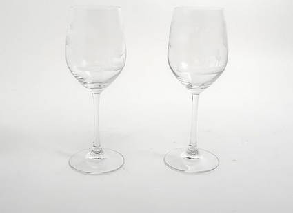 Queen's Lace (Pair of Wine Glasses): Queen's Lae (Pair of Wine Glasses). Queen Lace crystal is entirely hand blown, hand cut and hand polished in Germany. It is then engraved with the rare Copper-Wheel technique developed during the Rena