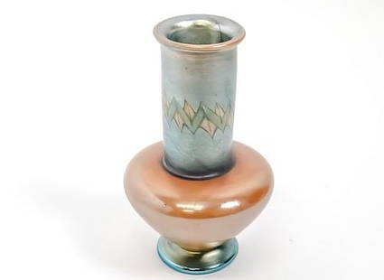 Tel-el-Amana Vase, L.C.T. Tiffany, Tiffany Studios Favrile Glass, 1904, #V262: Tel-el-Amana Vase, L.C.T. Tiffany, Tiffany Studios Favrile Glass, 1904, #V262. 6 in. high. 3 in. wide. Bowl base in gold and blue border with pulled green and yellow decoration. Favrile glass is a