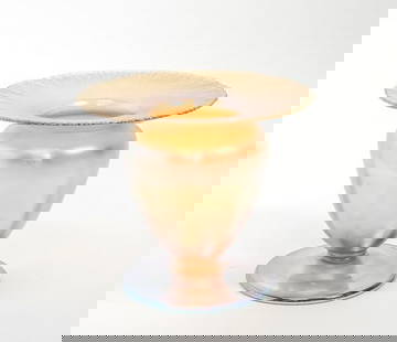 Gold Vase, Tiffany Studios, L. C. T. Tiffany, Favrile Glass, 1919.: Gold Vase, Tiffany Studios, L. C. T. Tiffany, Favrile Glass, 1919. Etched: L. C. Tiffany Inc. - Favrile 8999N 1546. A gold vase with ribbed and footed base flaring lip. Favrile glass is a type of