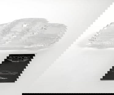 Daum BMW 750iL: BMW 750iL 1:14 Daum Scale Model. This BMW was produced by Daum in 1989 and retailed for $1,050. Daum is a crystal studio based in Nancy, France, founded in 1878 by Jean Daum. His sons, Auguste Daum