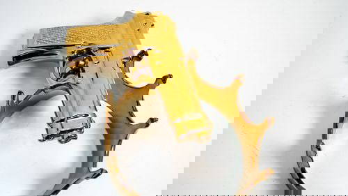 Seletti "My Gun" and "My Crown" Limited Gold Edition Pop Art Sculptures: Seletti "My Gun" and "My Crown" Limited Gold Edition Sculptures "Memorabilia for My Memories" Collection. Seletti, a company history of vision and evolution. A story that began in 1964 by Romano