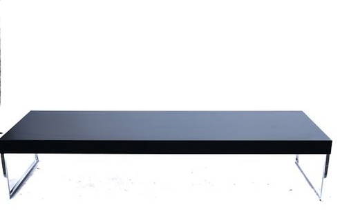 Danish Fritz Hansen Coffee Table by Poul Kjaerholm: The Fritz Hansen PK63A is a coffee table designed by Poul Kjaerholm in 1968. The minimalist table features a satin brushed stainless steel base. This table was purchased for $5,600. Approximate