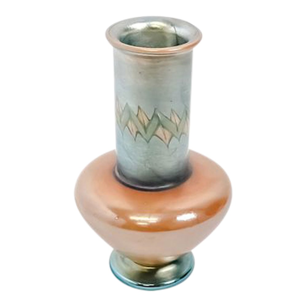 Tel-el-Amana Vase, L.C.T. Tiffany, Tiffany Studios Favrile Glass, 1904, #V262: Tel-el-Amana Vase, L.C.T. Tiffany, Tiffany Studios Favrile Glass, 1904, #V262. 6 in. high. 3 in. wide. Bowl base in gold and blue border with pulled green and yellow decoration. Favrile glass is a typ