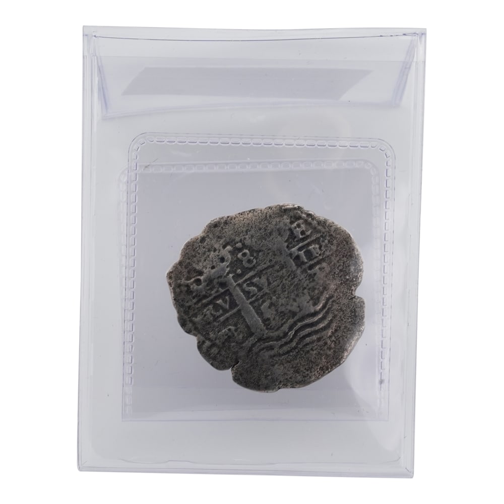 (1654)P E PH Bolivia 8R Silver Coin: (1654)P E PH Bolivia 8R Coin. (16.00g). NGC: 2946070-005. The (1654)P E PH Bolivia 8R coin is a Spanish colonial silver 8 Reales struck at the Potos? mint in 1654, during the reign of King Philip IV. 