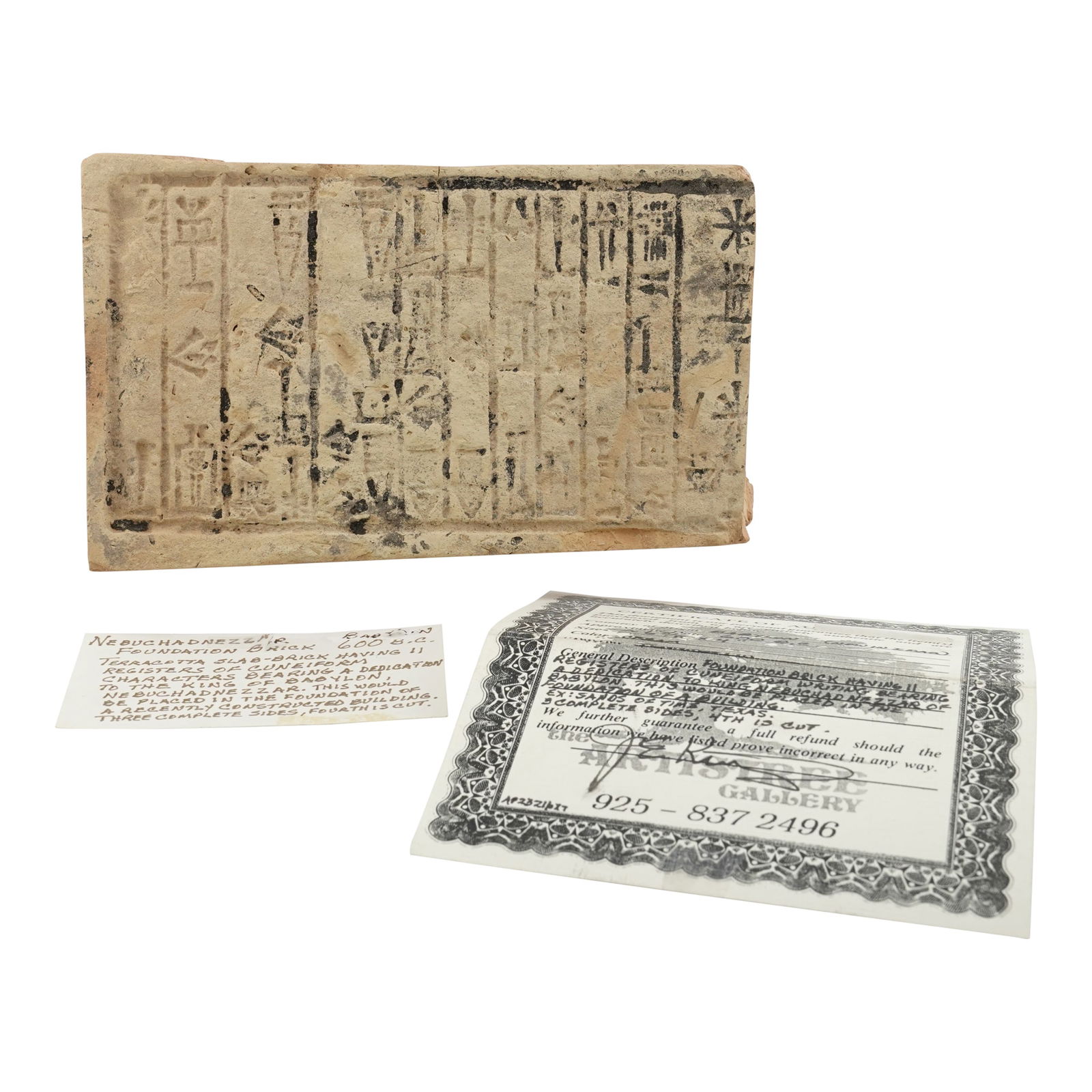 King Nebuchadnezzar of Babylon Foundation Slab-Brick 600 B.C. 11 Registers of Cuneiform Characters: Terracotta Slab-Brick Having 11 Registers of Cuneiform Characters Bearing a Dedication to the King of Babylon, Nebuchadnezzar. This Slab-Brick would have been placed in the foundation of a recently co