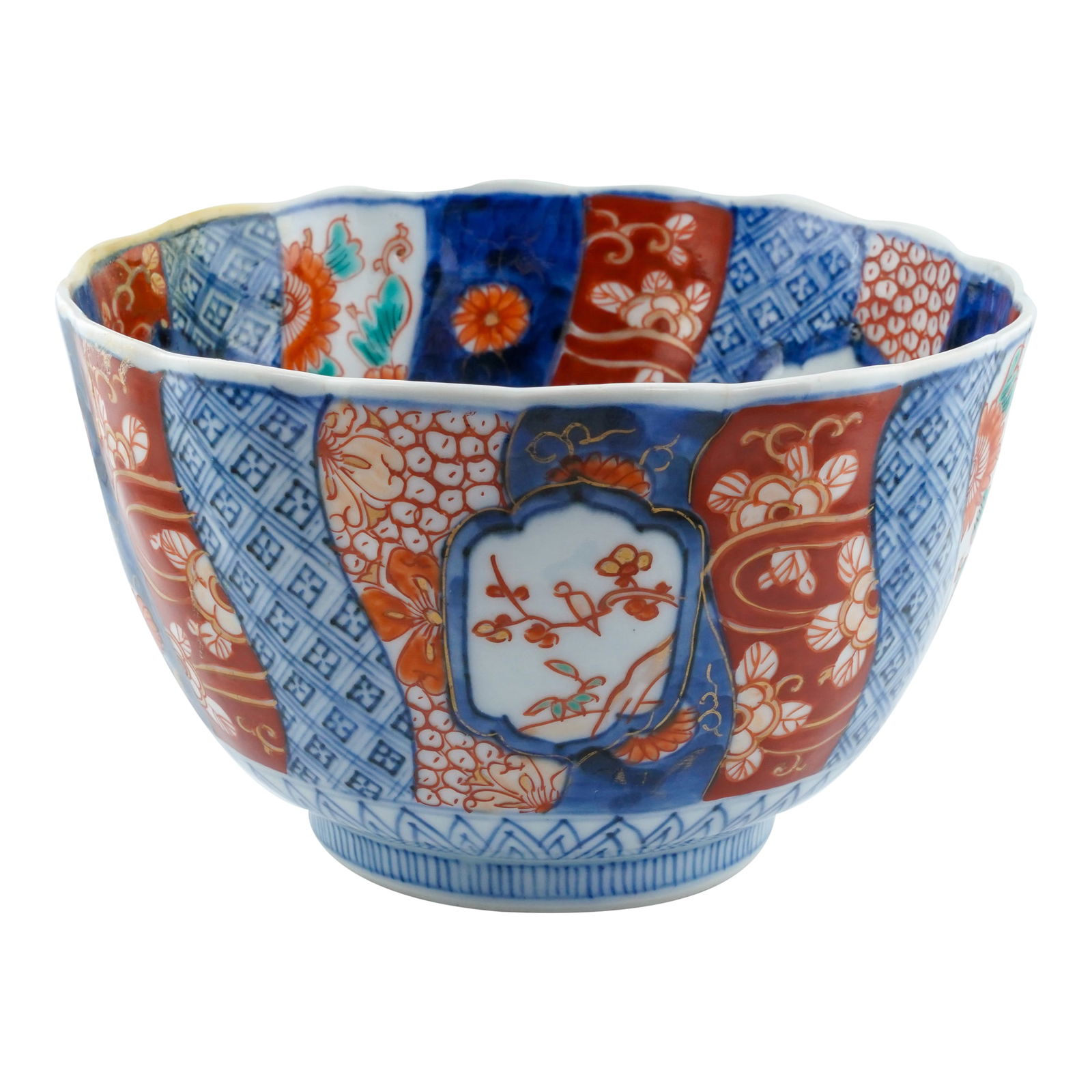 Japanese Imari Porcelain Chrysanthemum Bowl: Japanese Imari Porcelain Chrysanthemum Bowl, possibly from the Meiji Period (1868-1912).It features a scalloped, lobed rim and a ribbed body. The dense decoration includes shaped cartouches enclosing