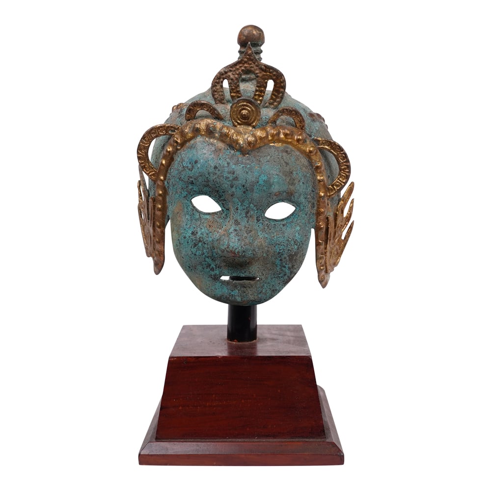Chinese Bronze Ceremonial Mask or Helmet: Chinese Bronze Ceremonial Mask or Helmet on custom modern stand. The mask features a gilt finish and an oxidized bronze patina, Shang dynasty (c. 1600-1046 BCE). These types of masks are often referre