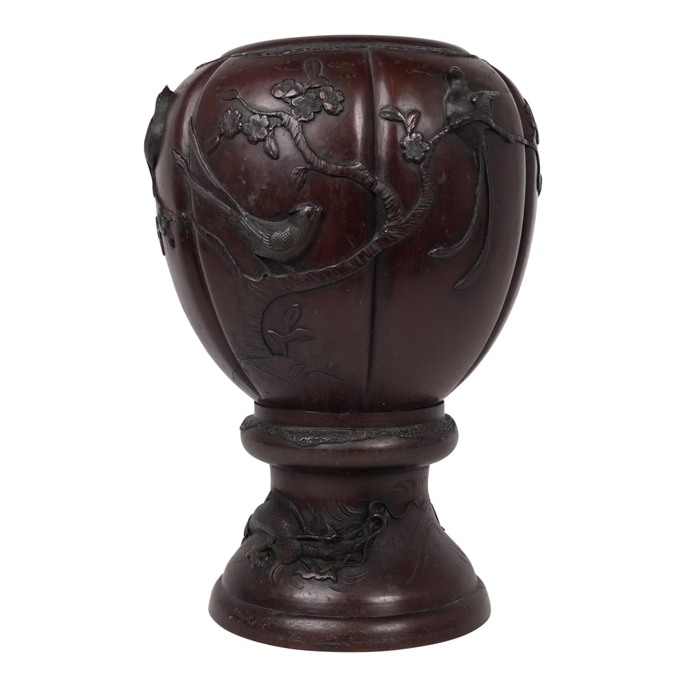 Japanese Large Bronze Urn or Jardiniere Meiji Period: Japanese Large Bronze Urn or Jardiniere Meiji Period. The bronze piece features a relief decoration of birds, cherry blossoms and branches.?It has a reddish-brown patina, which is a common characteris