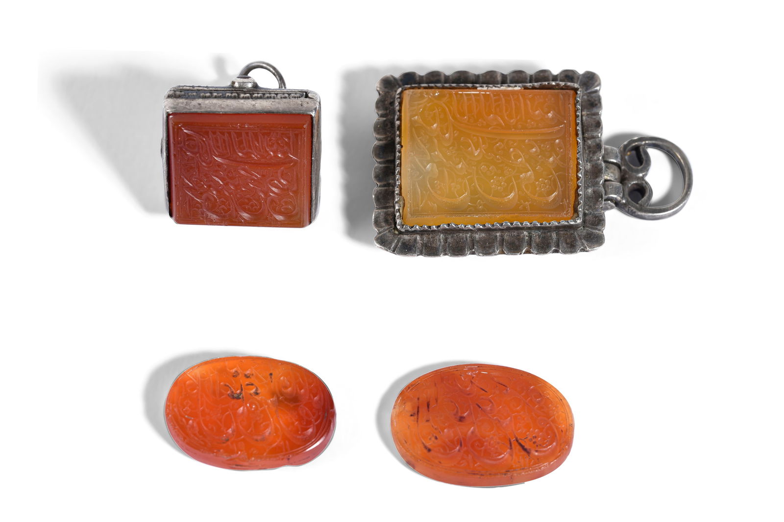 FOUR QAJAR INTAGLIO SEALS WITH PRAYERS Qajar Iran, dated to the first half of the 19th century (1 of 6)