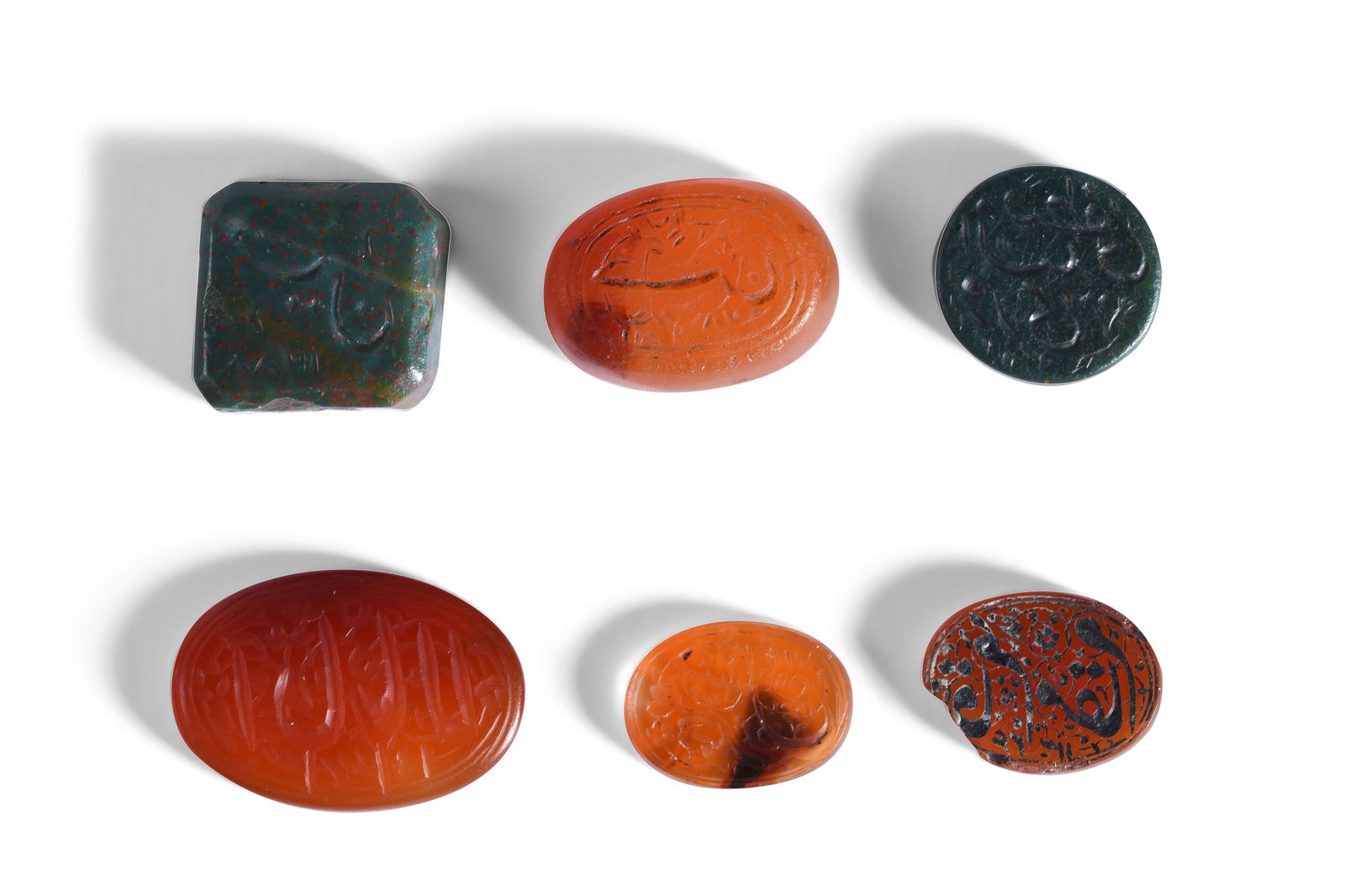 SIX NOMINAL INTAGLIO SEALS Qajar Iran and Northern India, mostly mid to late 19th century: SIX NOMINAL INTAGLIO SEALSPROPERTY FROM A PRIVATE GLYPTOLOGY COLLECTORQajar Iran and Northern India, mostly mid to late 19th century Comprising a circular, a square, and four oval engraved seals, most