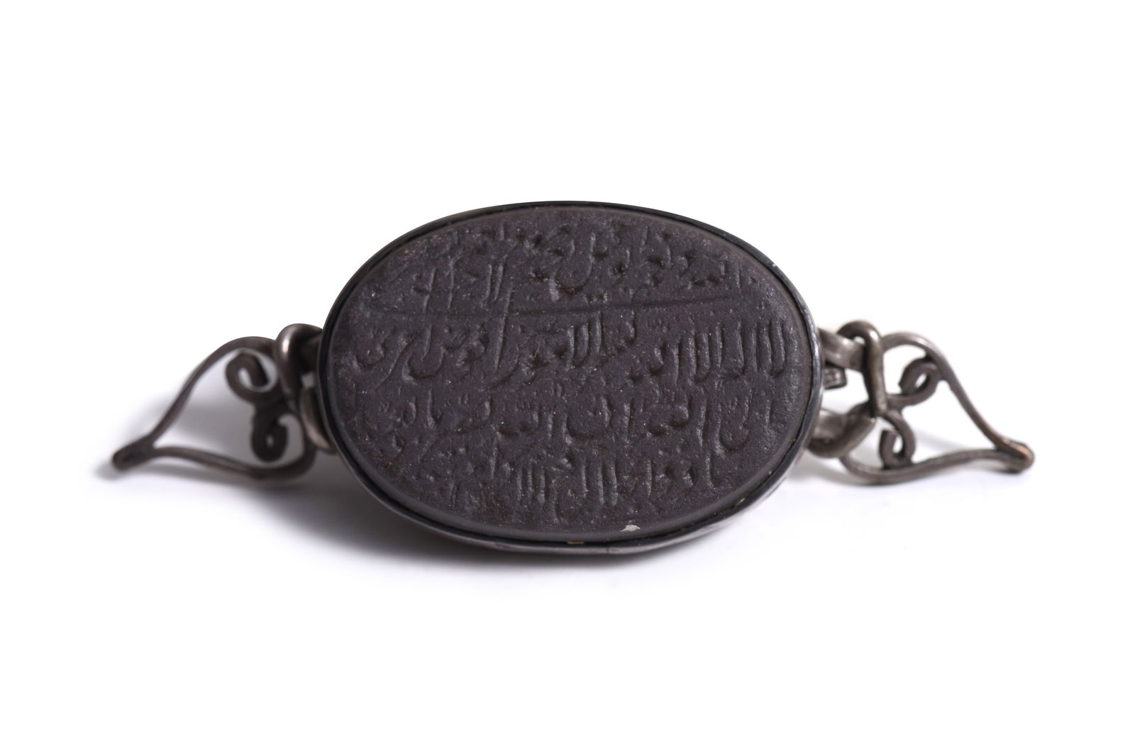 A TALISMANIC BAZUBAND PENDANT WITH ARABIC PRAYERS AND INVOCATIONS Possibly Iran or Northern India, (1 of 7)