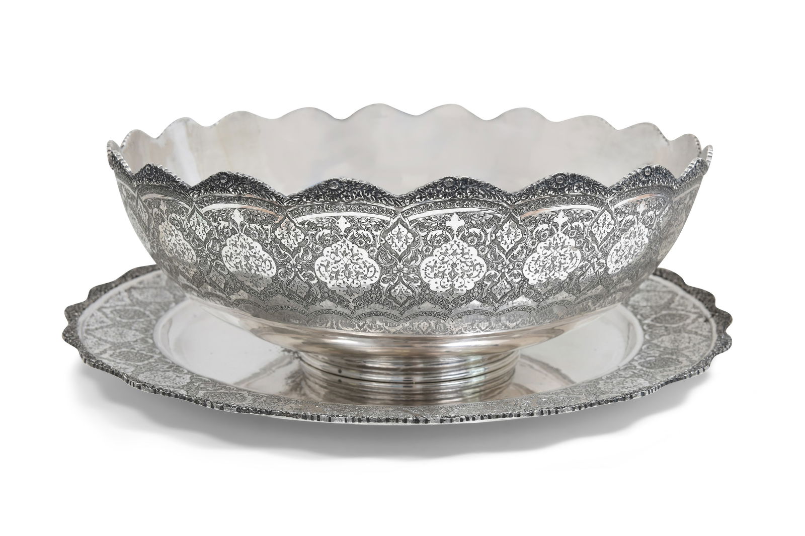 A LARGE ENGRAVED IRANIAN SILVER BOWL AND TRAY BY MAHMUD RABI'I Pahlavi Iran, ca. 1960 - 1970 (1 of 7)