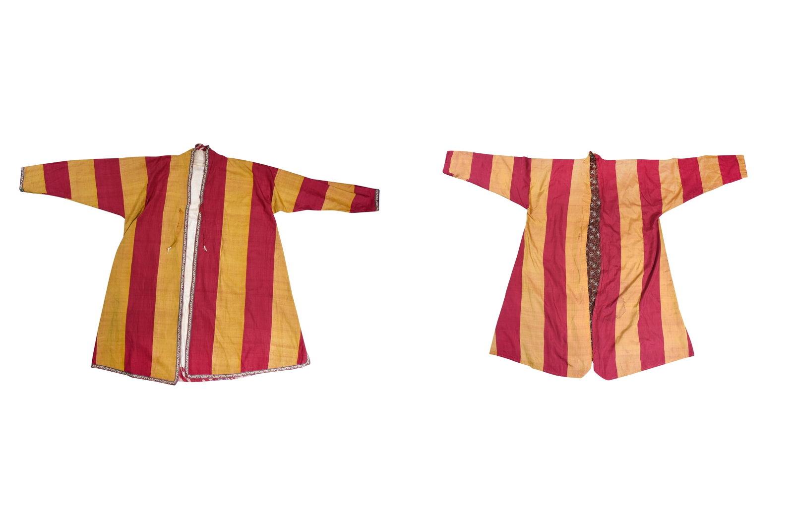 A NEAR PAIR OF STRIPED SILK UZBEK MEN'S KAFTANS (CHAPAN) Uzbekistan, Central Asia, second half 19th: A NEAR PAIR OF STRIPED SILK UZBEK MEN'S KAFTANS (CHAPAN)