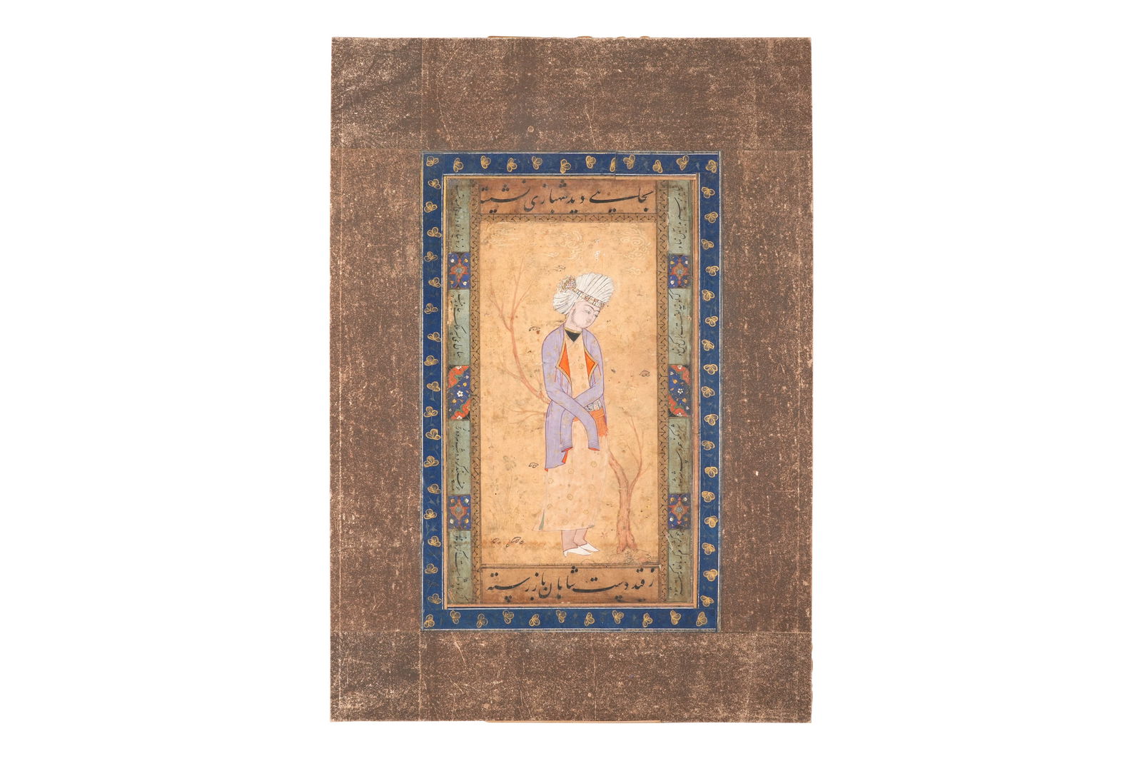 AN ARCHAISTIC SAFAVID-REVIVAL MURAQQA' FOLIO WITH A YOUTH IN A GARDEN Qajar Iran, 19th century: AN ARCHAISTIC SAFAVID-REVIVAL MURAQQA' FOLIO WITH A YOUTH IN A GARDENQajar Iran, 19th century Opaque pigments heightened with gold on paper pasted on board, depicting a slender youth standing by