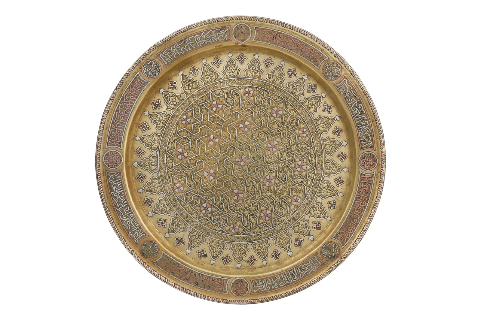 A DAMASCUS-WARE SILVER AND COPPER-INLAID BRASS DISH WITH STELLAR AND FLORAL DECORATION Damascus, (1 of 3)