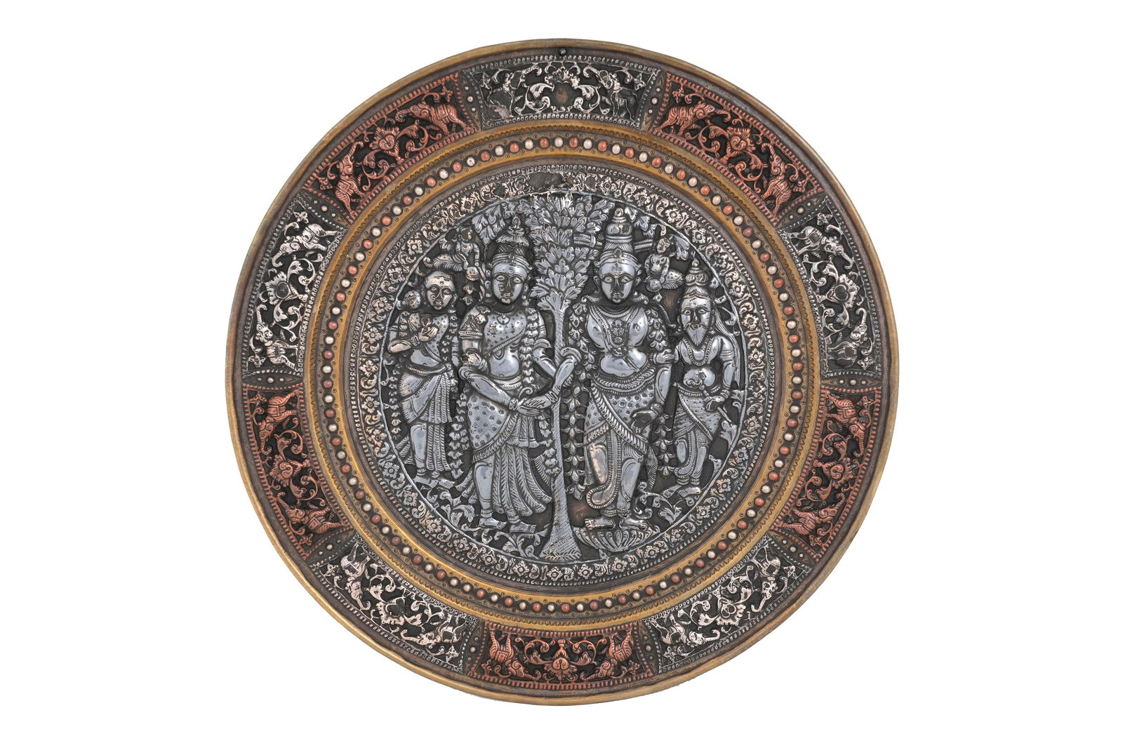 A TANJORE SILVER AND COPPER-OVERLAID BRASS DISH WITH HINDU DEITIES Tamil Nadu, South India, first (1 of 3)