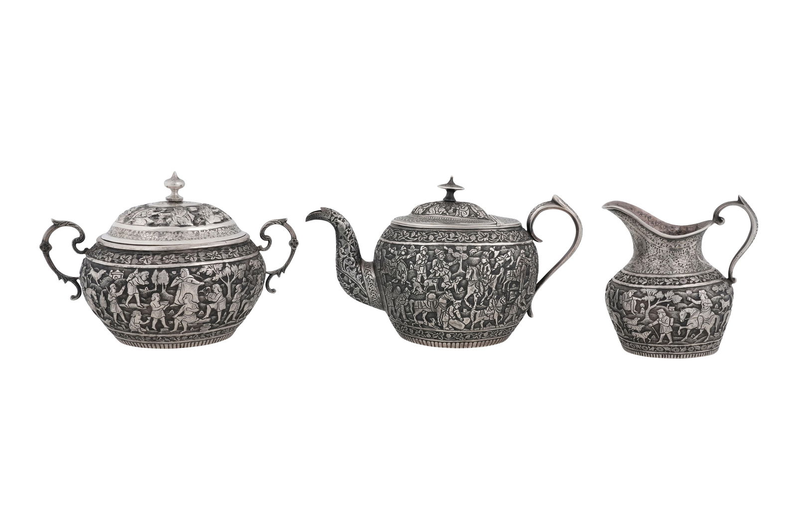 AN UNMARKED IRANIAN (PERSIAN) THREE-PIECE SILVER TEA SET Possibly Isfahan, Late Qajar Iran, early (1 of 10)
