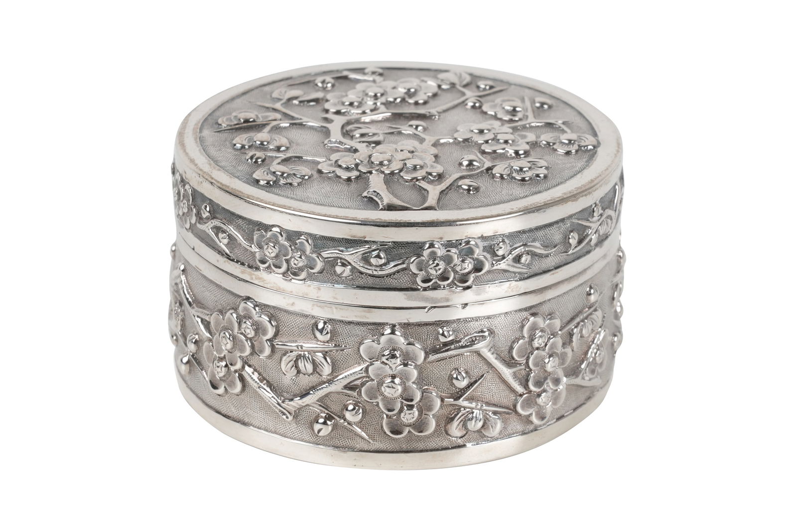A CHINESE EXPORT SILVER SNUFFBOX WITH BLOSSOMING PRUNUS Canton, Hong Kong, ca. 1900, retailed by Wan (1 of 5)
