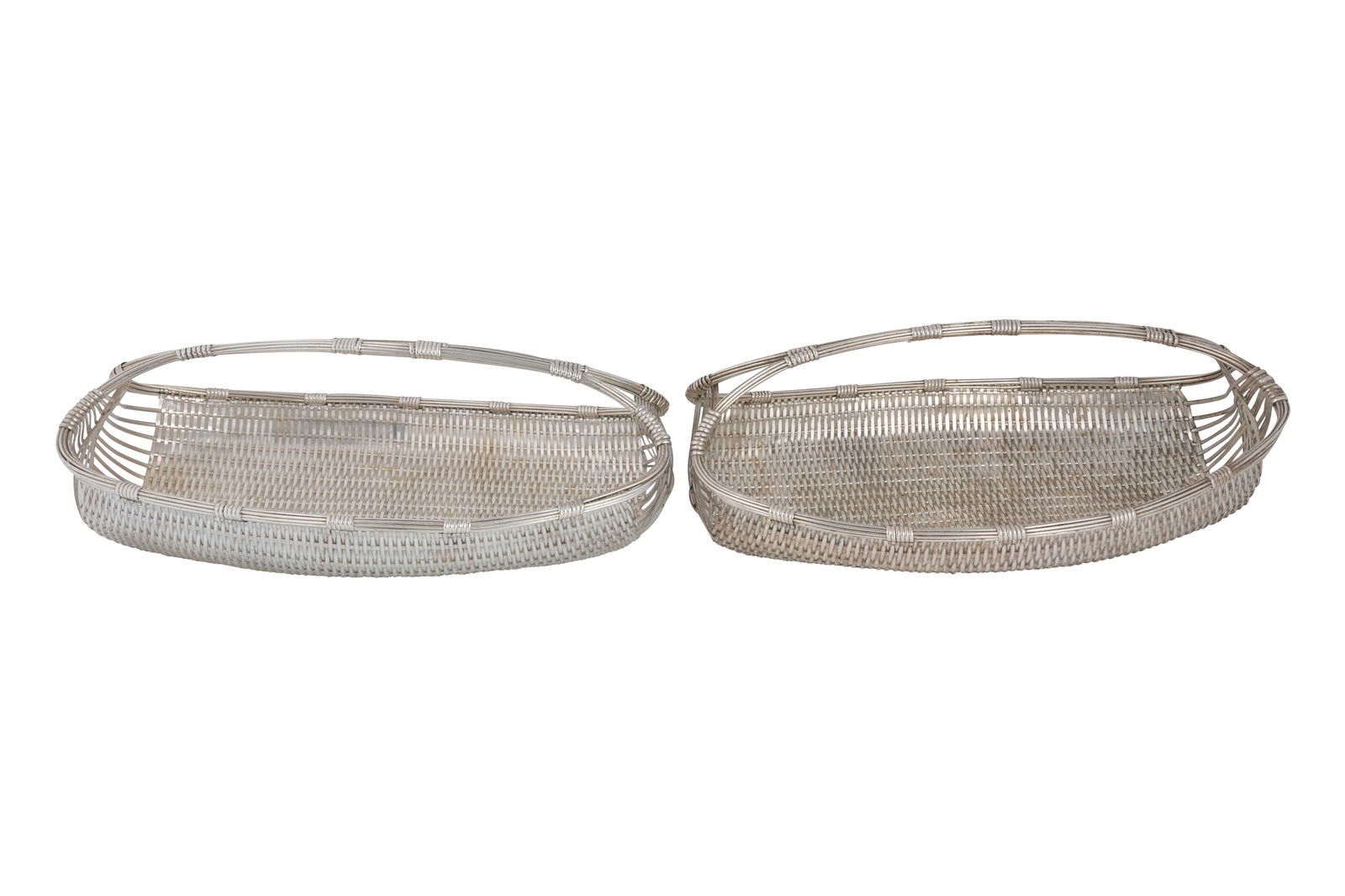 A PAIR OF UNMARKED FRENCH SILVER-PLATED WOVEN FRUIT BASKETS France, ca. 1960s - 1970s (1 of 4)