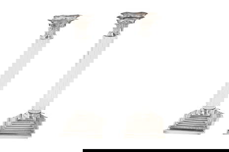 A NEAR PAIR OF VINTAGE NEOCLASSICAL SILVER-PLATED AND GLASS CANDLESTICKS Made by Topazio, Portugal,: A NEAR PAIR OF VINTAGE NEOCLASSICAL SILVER-PLATED AND GLASS CANDLESTICKS Made by Topazio, Portugal, ca. 1940s - 1980s The near pair of candlesticks crafted in a neoclassical architectural style by