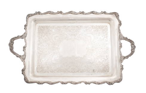 A WEBSTER WILCOX SILVER PLATED TRAY Circa 1961 - 1981: A WEBSTER WILCOX SILVER PLATED TRAY Circa 1961 - 1981 Of rectangular shape, with foliate rim and handles, the flat surface intricately engraved with swirling foliage and flowers 37cm x 59.5cm