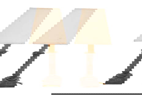 A PAIR OF CHINESE WHITE METAL LAMPS China, early 20th century: A PAIR OF CHINESE WHITE METAL LAMPS China, Early 20th century Each cast as a ribbed column resting on a square-section foot, decorated with studs and stylised lappets, maker's marks