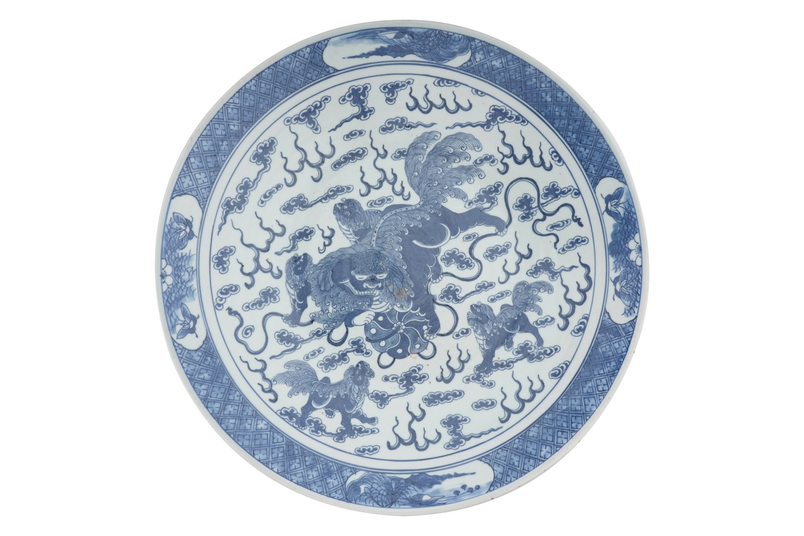 A MASSIVE CHINESE BLUE AND WHITE 'LION DOG' CHARGER Circa 1900 or earlier (1 of 5)