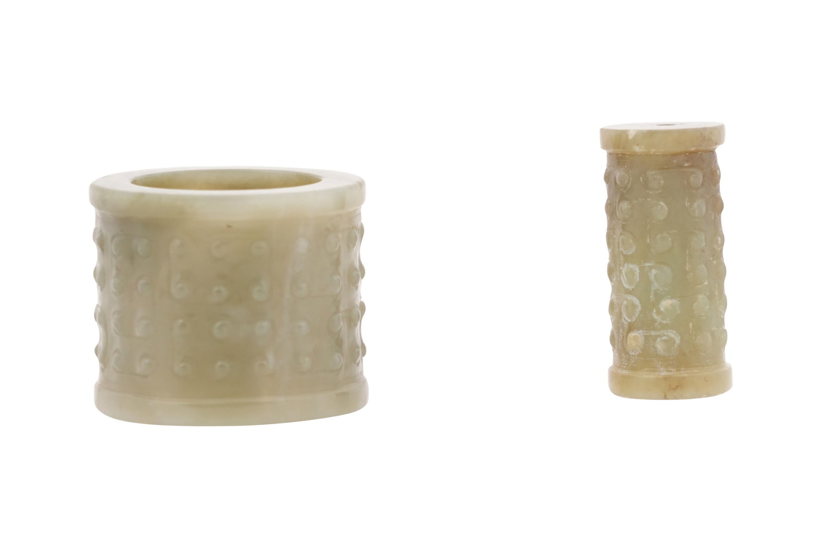 TWO CHINESE PALE CELADON JADE ARCHAISTIC CARVINGS Possibly Qing dynasty (1 of 3)